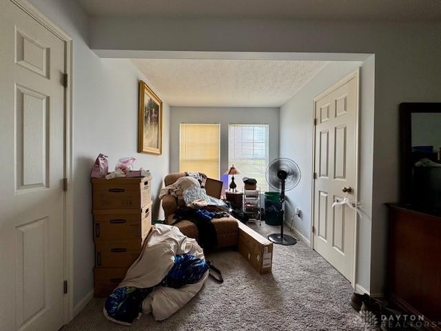 6460 Woodcreek Dr, Middletown, OH 45042 - bedroom with carpet flooring and baseboards