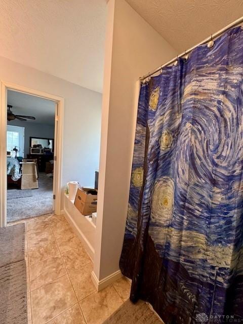 6460 Woodcreek Dr, Middletown, OH 45042 - full bath featuring tile patterned floors and a shower with shower curtain