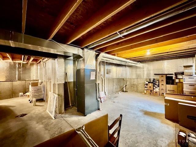 6460 Woodcreek Dr, Middletown, OH 45042 - unfinished below grade area featuring heating unit