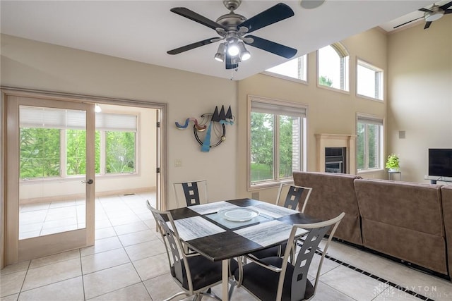 337 Yorkshire Ln, Beavercreek Twp, OH 45385 - dining area featuring ceiling fan, light tile patterned floors, plenty of natural light, and french doors