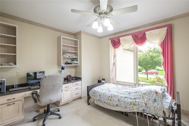 337 Yorkshire Ln, Beavercreek Twp, OH 45385 - bedroom with crown molding, a ceiling fan, light colored carpet, and built in study area