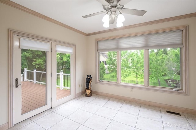 337 Yorkshire Ln, Beavercreek Twp, OH 45385 - unfurnished room featuring healthy amount of natural light, crown molding, ceiling fan, and light tile patterned floors