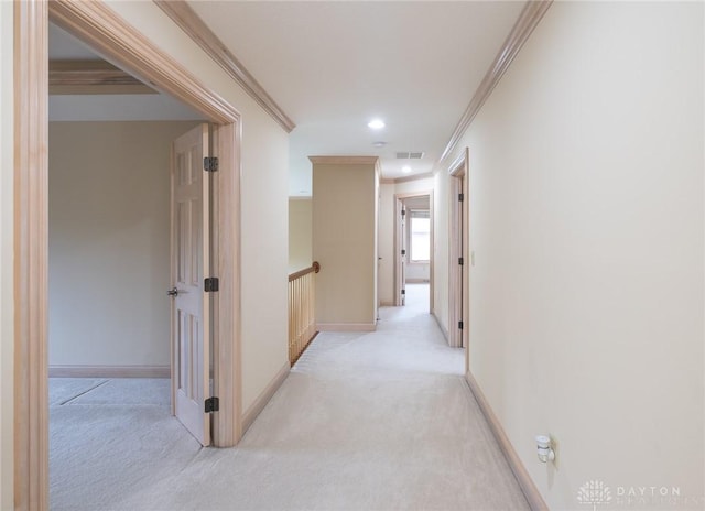 337 Yorkshire Ln, Beavercreek Twp, OH 45385 - hallway featuring light colored carpet, ornamental molding, and recessed lighting