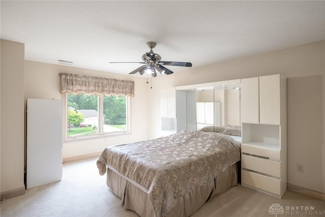 337 Yorkshire Ln, Beavercreek Twp, OH 45385 - bedroom featuring light carpet and ceiling fan