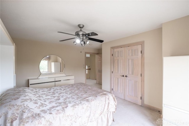 337 Yorkshire Ln, Beavercreek Twp, OH 45385 - bedroom with a closet, light colored carpet, and ceiling fan