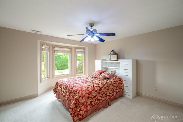 337 Yorkshire Ln, Beavercreek Twp, OH 45385 - bedroom with light colored carpet and ceiling fan
