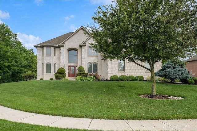 337 Yorkshire Ln, Beavercreek Twp, OH 45385 - view of front facade featuring a front lawn and brick siding