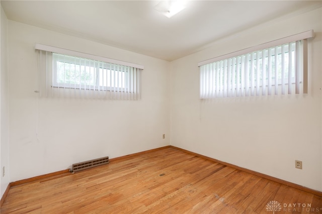 8866 Meadowlark Dr, Franklin, OH 45005 - spare room featuring plenty of natural light and light wood finished floors