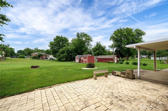 8866 Meadowlark Dr, Franklin, OH 45005 - view of patio featuring a storage shed