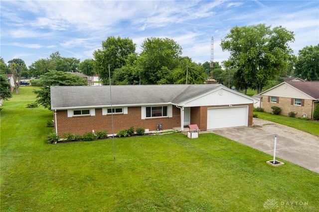 8866 Meadowlark Dr, Franklin, OH 45005 - ranch-style house with a garage, brick siding, driveway, and a front lawn