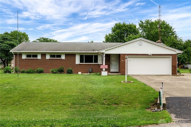 8866 Meadowlark Dr, Franklin, OH 45005 - single story home with an attached garage, concrete driveway, brick siding, and a front yard
