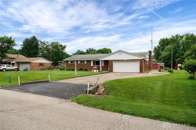 8866 Meadowlark Dr, Franklin, OH 45005 - single story home with concrete driveway, a front lawn, an attached garage, and brick siding