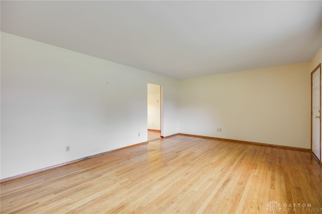 8866 Meadowlark Dr, Franklin, OH 45005 - empty room featuring light wood finished floors and baseboards
