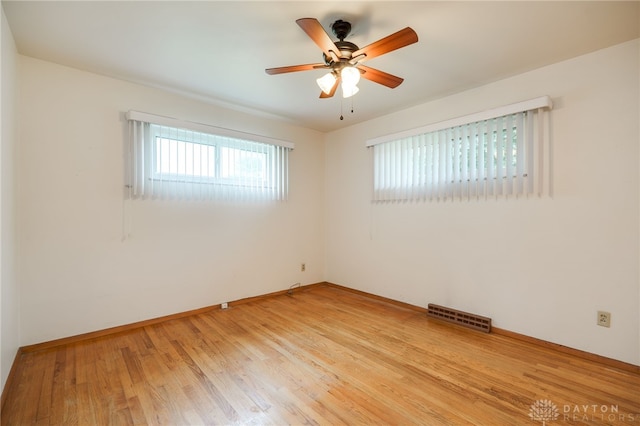 8866 Meadowlark Dr, Franklin, OH 45005 - empty room featuring light wood finished floors and ceiling fan