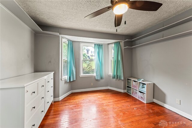 405 Hyde Park Dr, Hamilton, OH 45013 - unfurnished bedroom with light wood-style floors and a ceiling fan