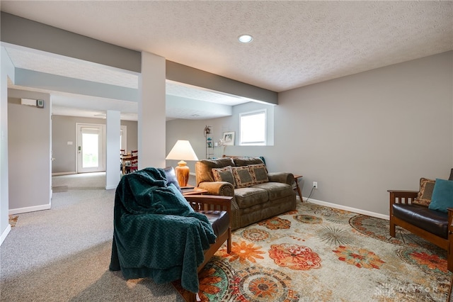 9256 Amchar Ct, Dayton, OH 45458 - living room featuring carpet floors, healthy amount of natural light, a textured ceiling, and recessed lighting