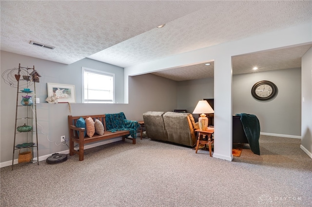 9256 Amchar Ct, Dayton, OH 45458 - living area featuring carpet flooring, a textured ceiling, and recessed lighting