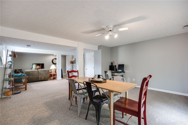 9256 Amchar Ct, Dayton, OH 45458 - carpeted dining room with ceiling fan and a textured ceiling