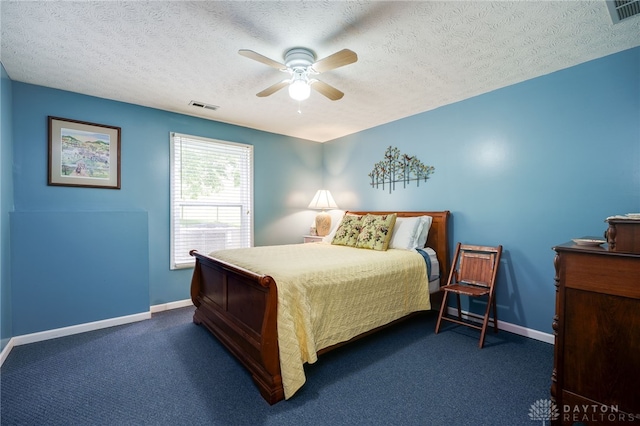 9256 Amchar Ct, Dayton, OH 45458 - carpeted bedroom with a textured ceiling and a ceiling fan