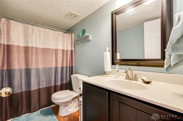 9256 Amchar Ct, Dayton, OH 45458 - full bath with vanity, a textured ceiling, wood finished floors, and curtained shower