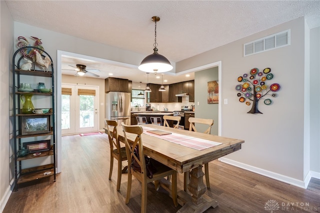 9256 Amchar Ct, Dayton, OH 45458 - dining area with wood finished floors, ceiling fan, and recessed lighting