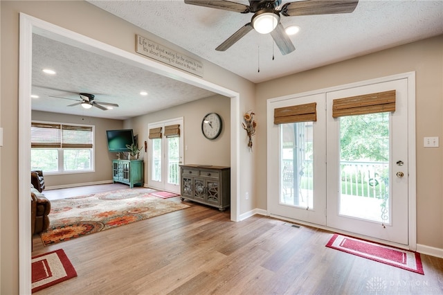 9256 Amchar Ct, Dayton, OH 45458 - entryway featuring ceiling fan, a textured ceiling, wood finished floors, and recessed lighting