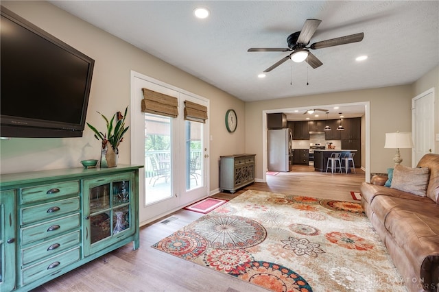 9256 Amchar Ct, Dayton, OH 45458 - living area with light wood-type flooring, recessed lighting, and a ceiling fan