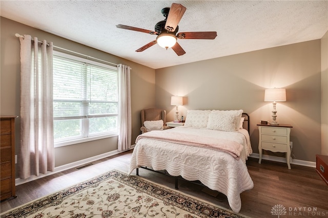 9256 Amchar Ct, Dayton, OH 45458 - bedroom featuring wood finished floors, a textured ceiling, and a ceiling fan