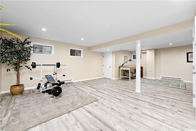 1027 W Bridlepath Ln, Miami Twp, OH 45140 - exercise room featuring a baseboard radiator, wood finished floors, and recessed lighting