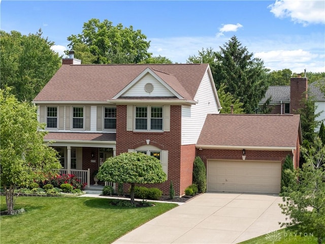 1027 W Bridlepath Ln, Miami Twp, OH 45140 - view of front of home featuring driveway, a porch, a garage, a chimney, and a front yard
