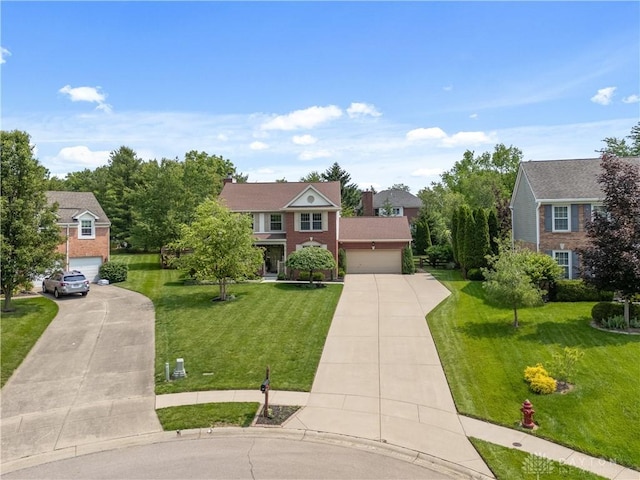 1027 W Bridlepath Ln, Miami Twp, OH 45140 - view of front facade featuring concrete driveway, a front yard, and an attached garage