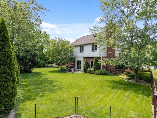 1027 W Bridlepath Ln, Miami Twp, OH 45140 - fenced backyard featuring a patio