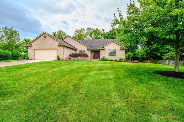 2690 Langtree Ln, Washington Twp, OH 45458 - ranch-style home featuring an attached garage, driveway, and brick siding