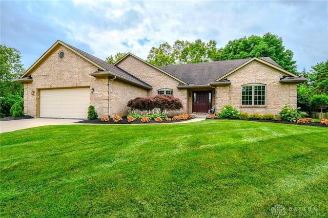 2690 Langtree Ln, Washington Twp, OH 45458 - view of front of house featuring brick siding, a garage, a front yard, and concrete driveway