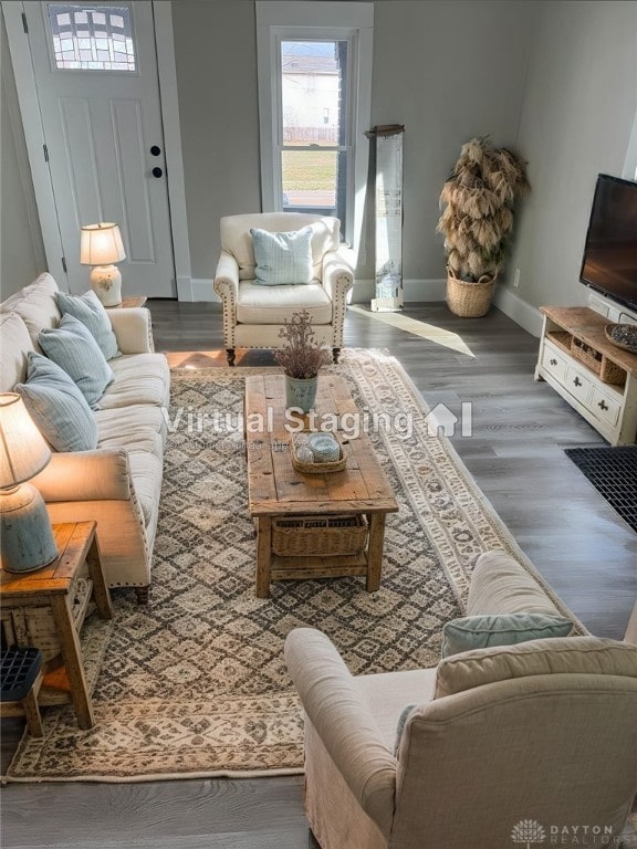 904 Crawford St, Middletown, OH 45044 - living room featuring baseboards and wood finished floors