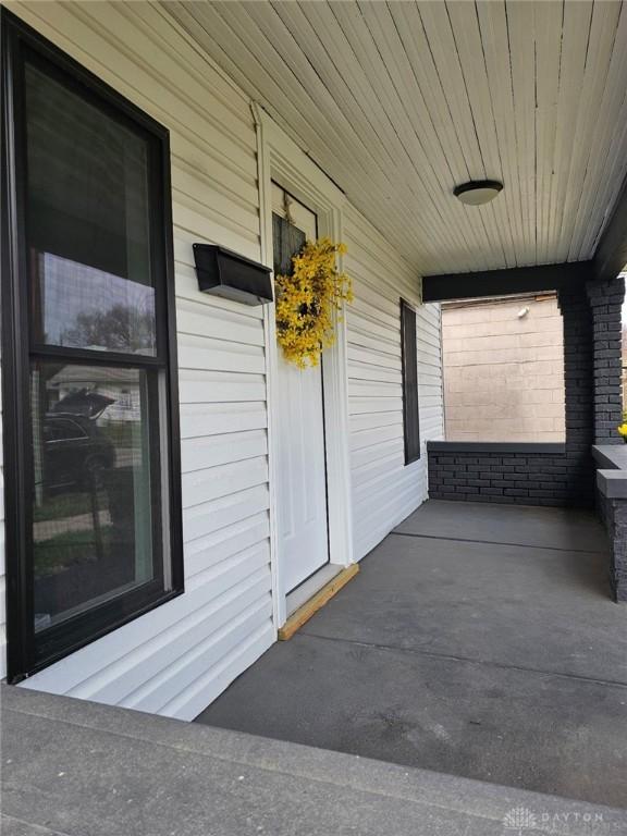 904 Crawford St, Middletown, OH 45044 - view of exterior entry featuring covered porch