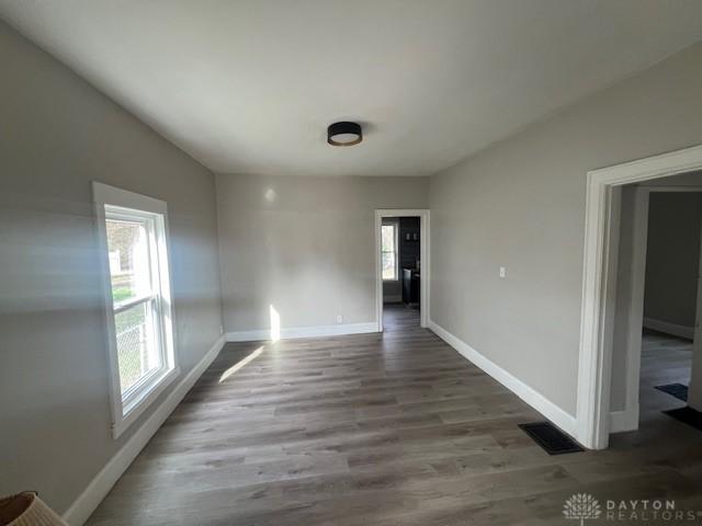 904 Crawford St, Middletown, OH 45044 - spare room featuring baseboards and wood finished floors
