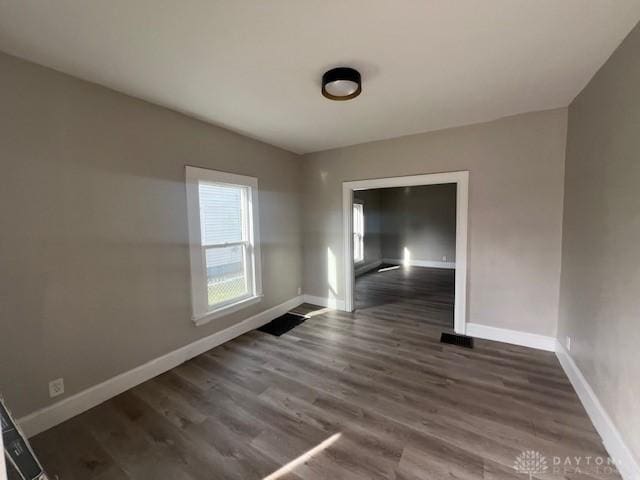 904 Crawford St, Middletown, OH 45044 - spare room with dark wood-style flooring