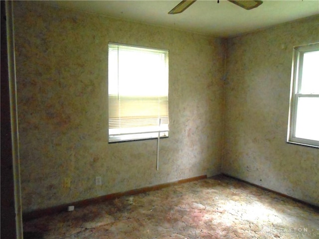 9705 E Haskett Ln, Bethel Twp, OH 45424 - spare room featuring healthy amount of natural light and a ceiling fan