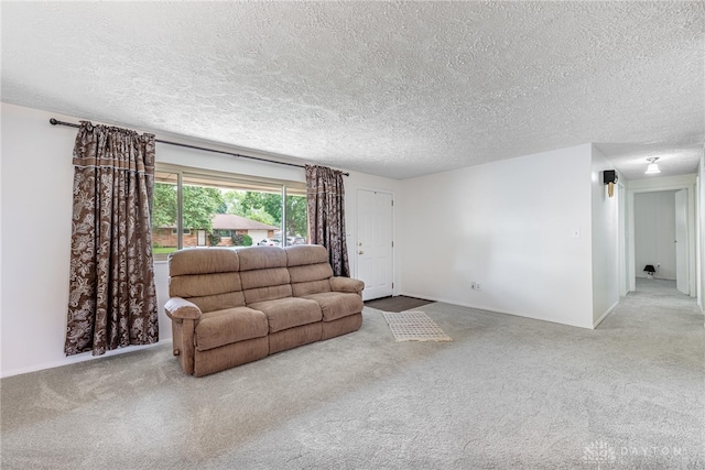 4501 Hannaford St, Miami Twp, OH 45439 - living area with a textured ceiling and carpet