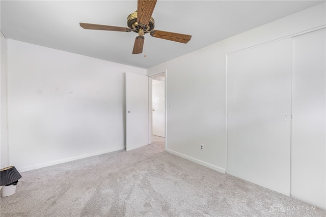 4501 Hannaford St, Miami Twp, OH 45439 - unfurnished bedroom with carpet, a closet, and a ceiling fan