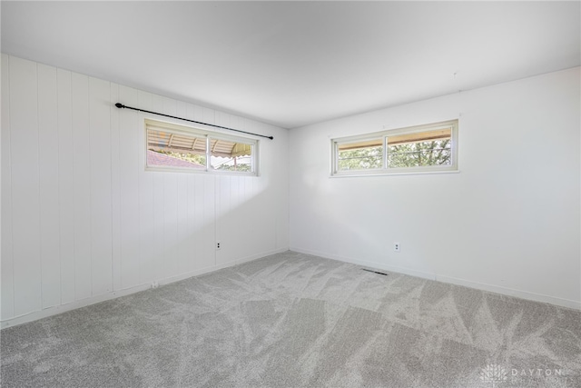4501 Hannaford St, Miami Twp, OH 45439 - empty room featuring carpet floors and healthy amount of natural light
