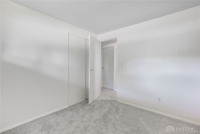 4501 Hannaford St, Miami Twp, OH 45439 - empty room featuring carpet flooring and baseboards