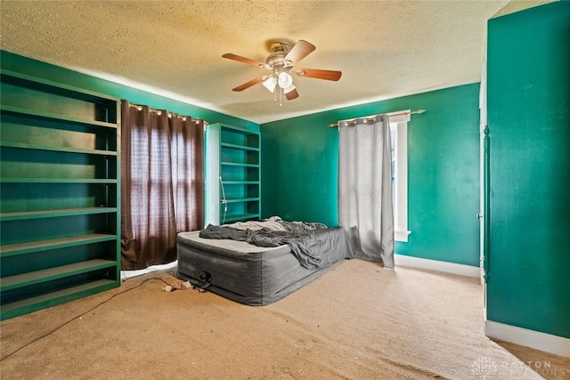 2311 S Dixie Dr, Kettering, OH 45409 - bedroom with a textured ceiling, carpet flooring, and ceiling fan