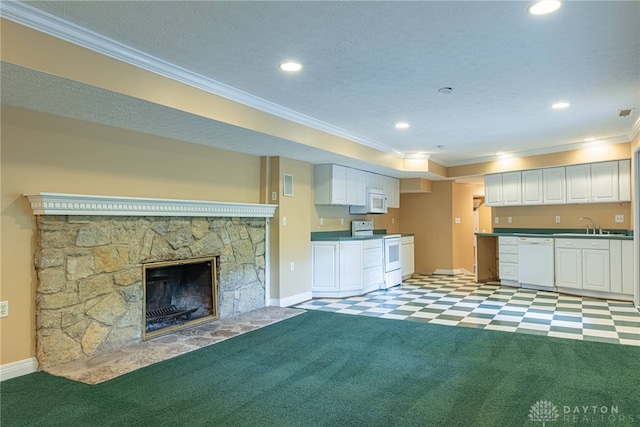 1919 Tait Circle Rd, Kettering, OH 45429 - unfurnished living room featuring ornamental molding, a fireplace, recessed lighting, light carpet, and a textured ceiling