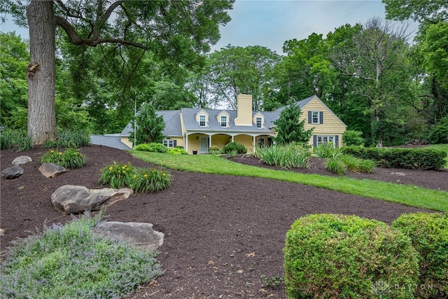 1919 Tait Circle Rd, Kettering, OH 45429 - cape cod home featuring a chimney and a porch