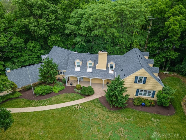 1919 Tait Circle Rd, Kettering, OH 45429 - view of front of property with a chimney, a front yard, and a shingled roof