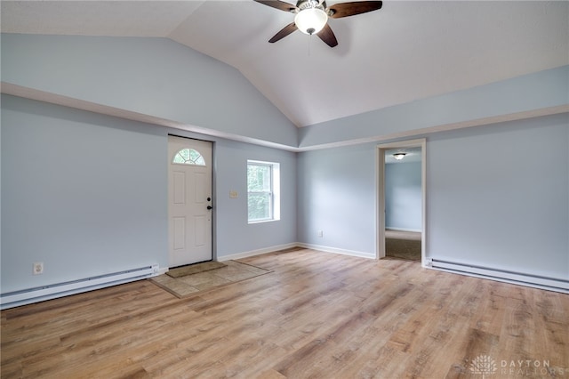 1717 Pershing Ave, Middletown, OH 45044 - foyer entrance featuring a baseboard heating unit, ceiling fan, wood finished floors, and high vaulted ceiling