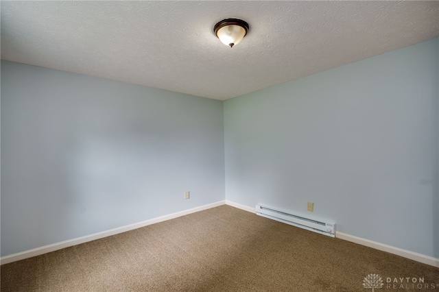 1717 Pershing Ave, Middletown, OH 45044 - empty room with a baseboard radiator, dark colored carpet, and a textured ceiling