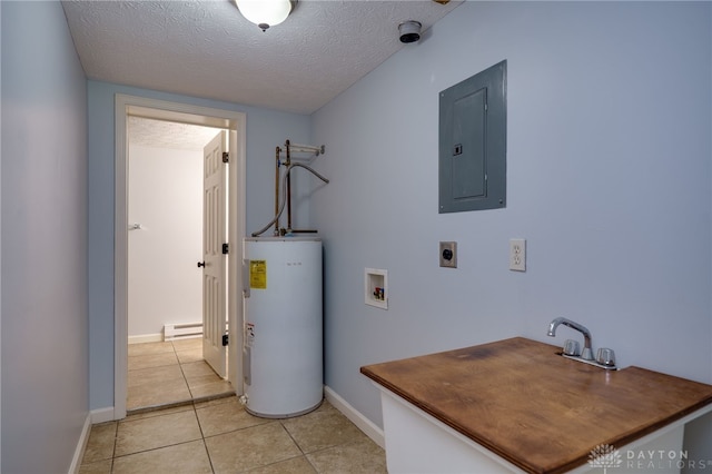 1717 Pershing Ave, Middletown, OH 45044 - laundry room featuring electric panel, hookup for an electric dryer, water heater, baseboard heating, and light tile patterned flooring